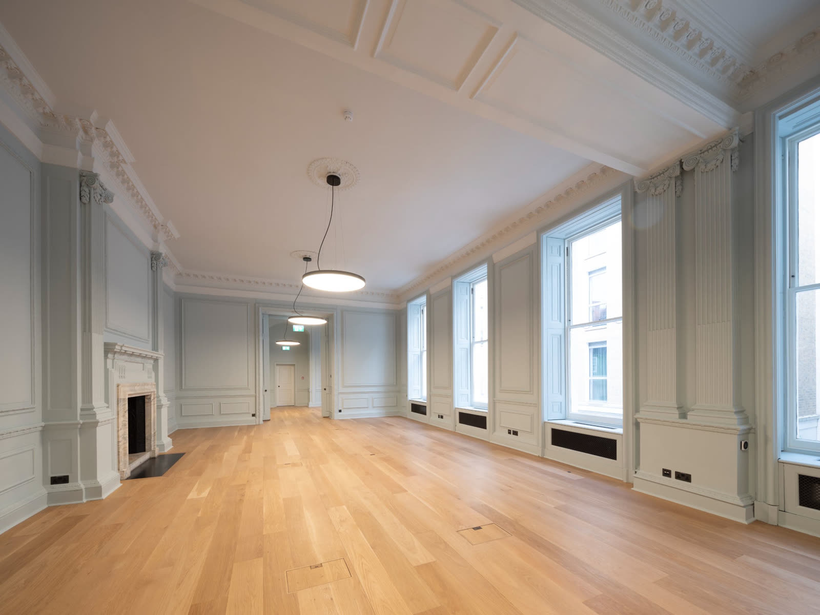Empty commercial office, 34 Grosvenor Street first floor long room, before virtual staging